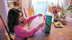 Girl opens a present
